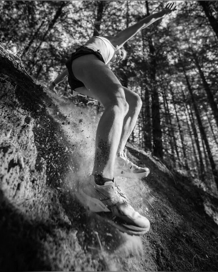 Trail runner wearing Hype Utility Gears performance shoes in Malaysia forest